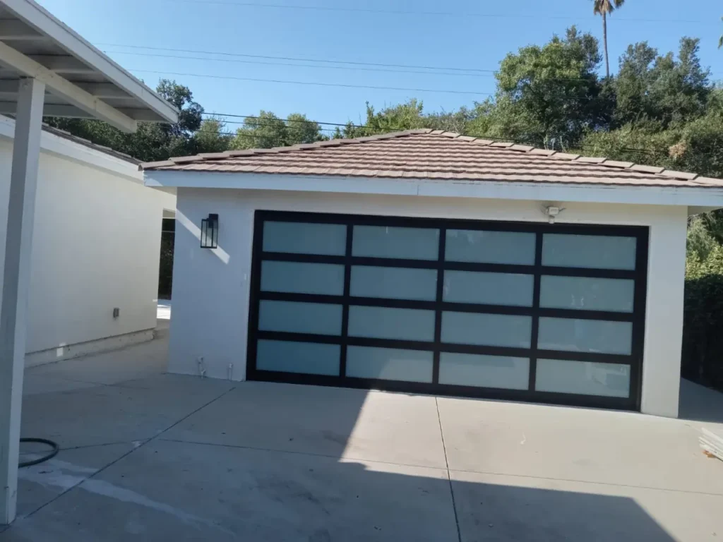 modern overhead garage door with black framing