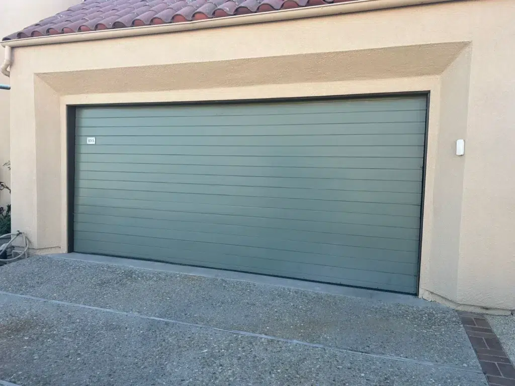 Garage Door Replacement Vs. Repair